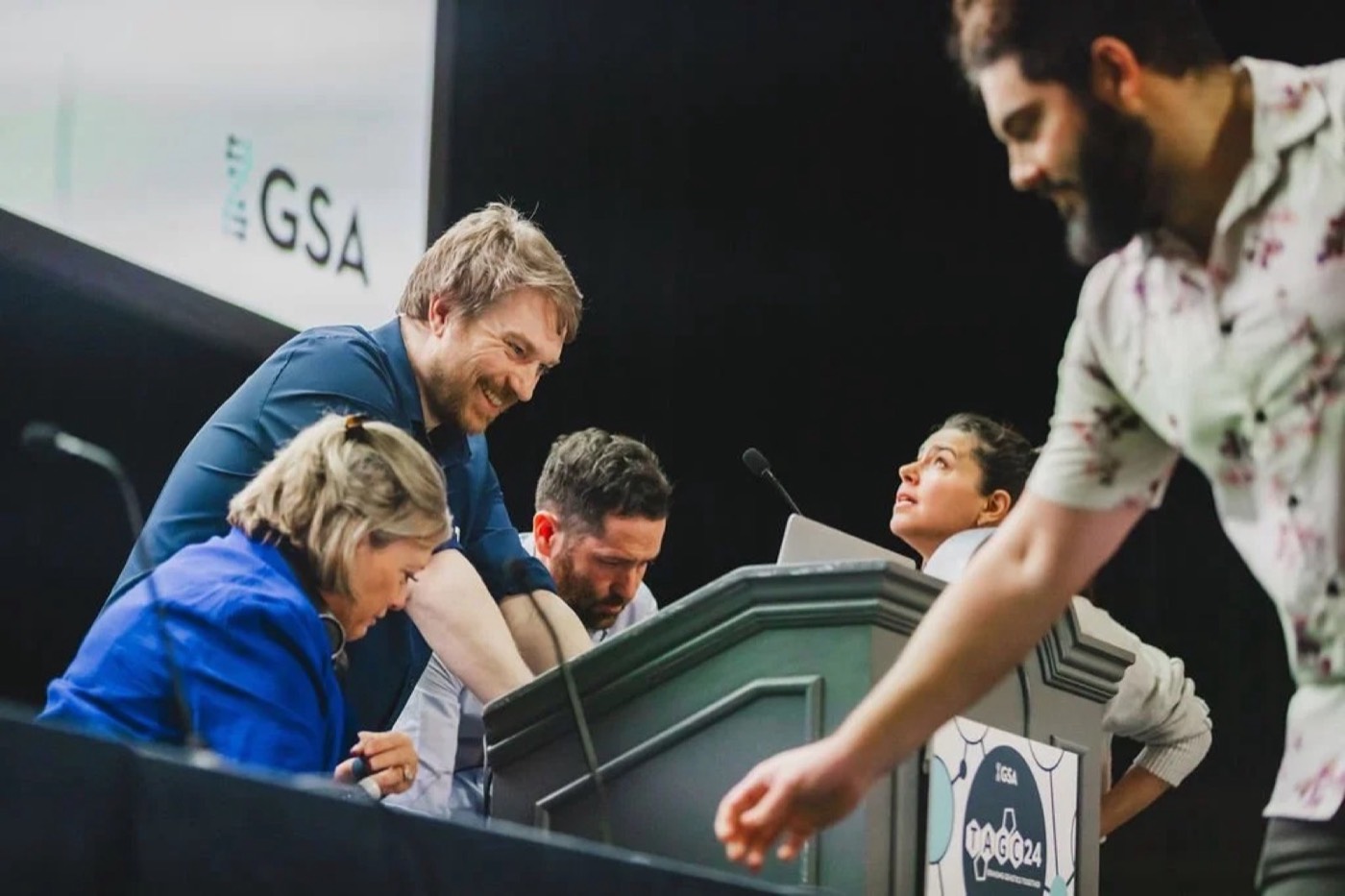 A WST team member helping an attendee