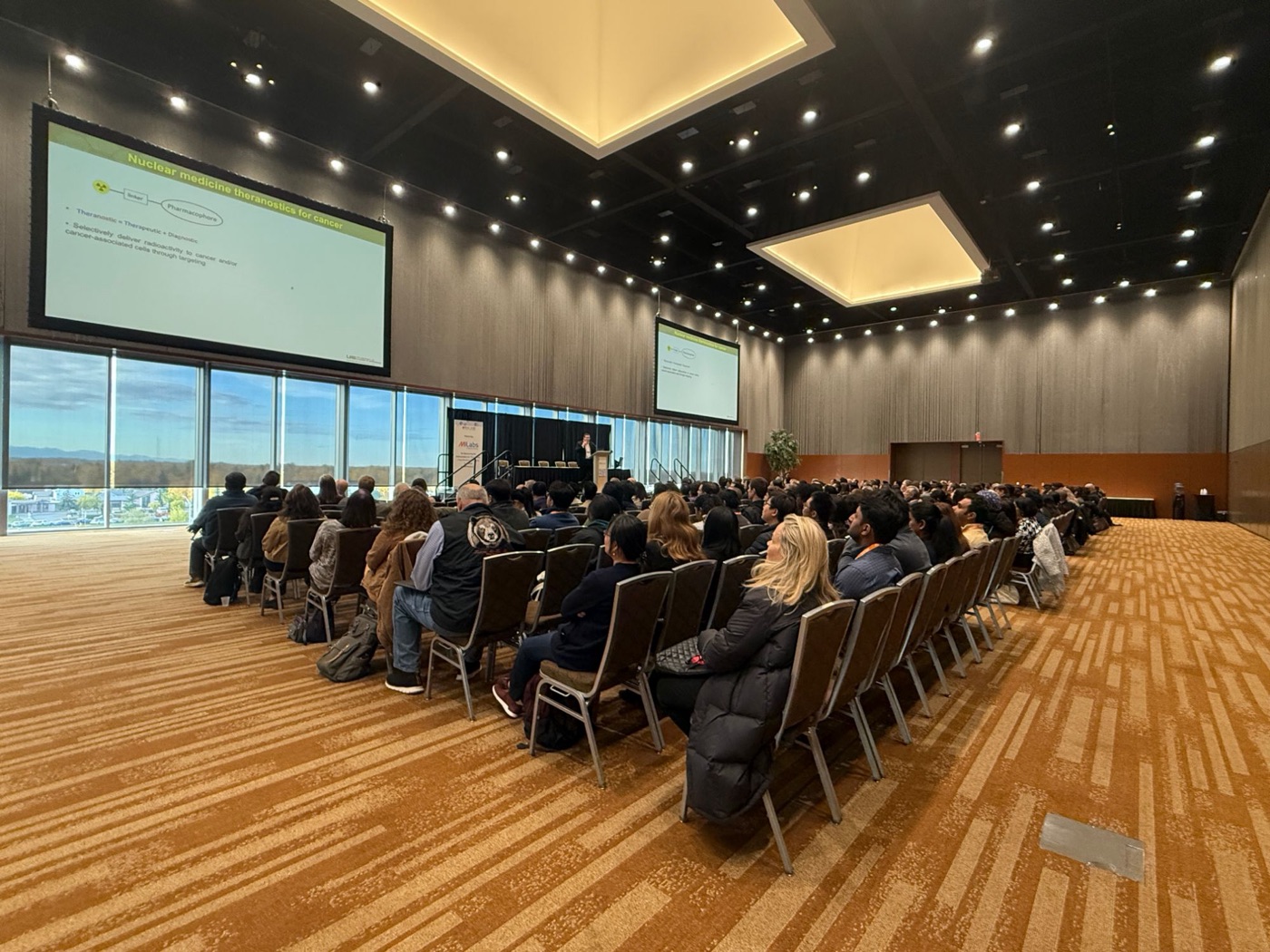 A full ballroom session with twin screens