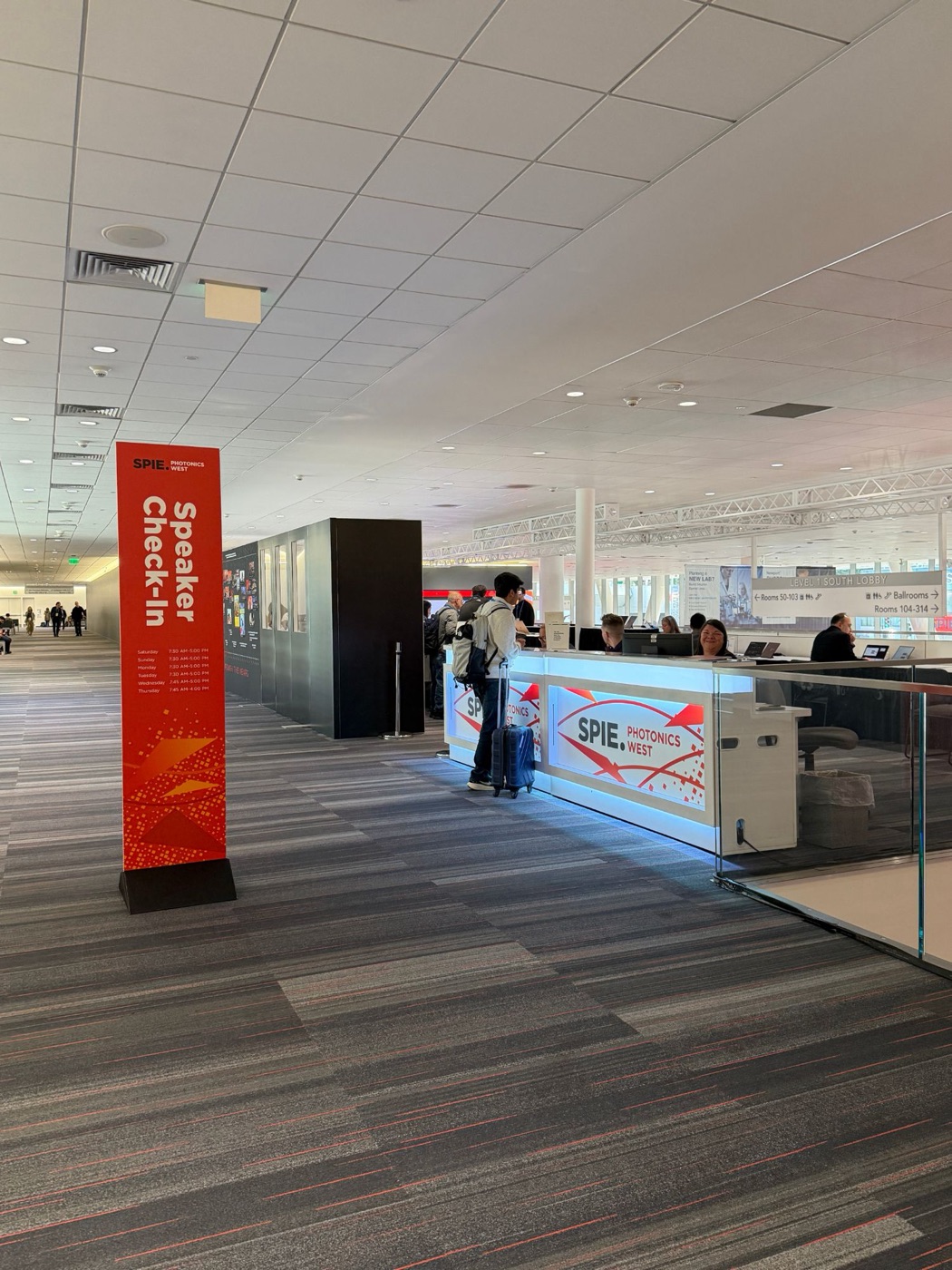 Speaker check-in desk at SPIE Photonics West